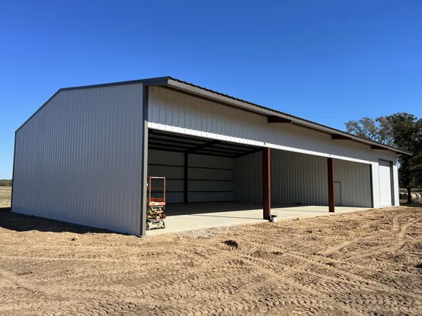 Steel building kit with an open shop bay, Van Alstyne, TX