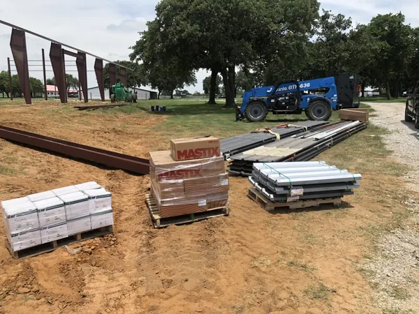 Metal panel bundles delivered to a pasture site, Whitesboro, TX