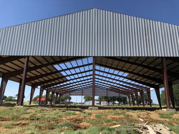 Under a steel-framed pavilion roof, Whitesboro, TX