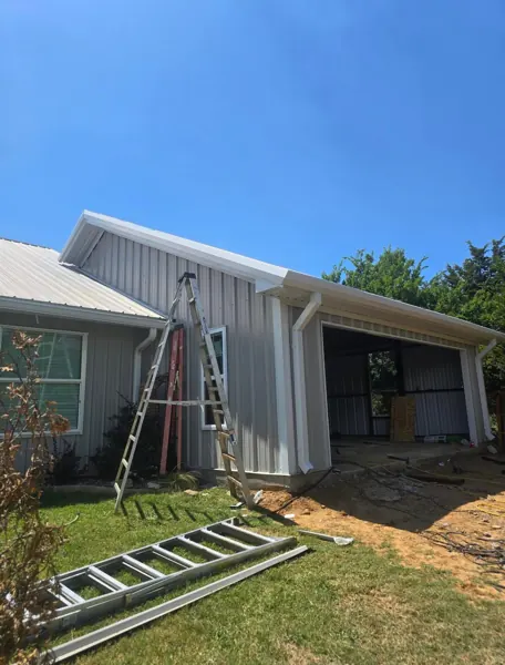 Standing seam metal panels on a new addition, Calera, OK