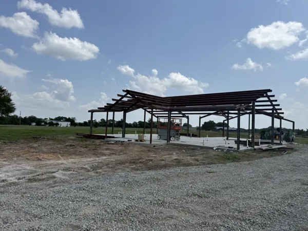 Steel beam and column frame for a shop with a lean-to, Sherman, TX