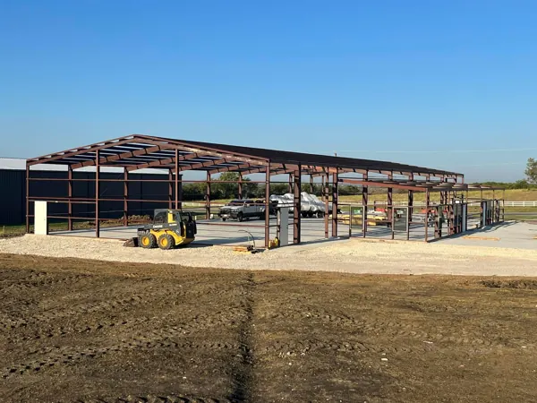 Wide steel frame erected on a large pad, Sherman, TX