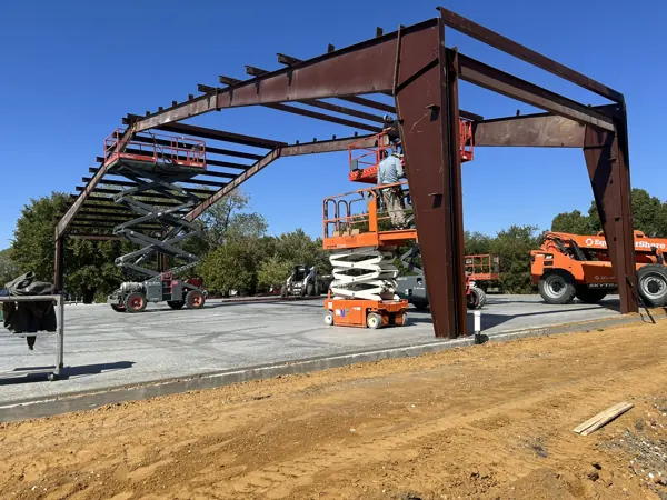 Steel column and roof beam frame with a lift inside, Howe, TX