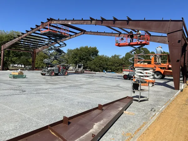 Steel frame with two lifts setting beams, Denison, TX