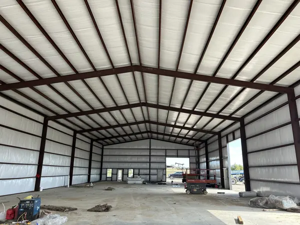 Inside a metal building looking up at the new roof, Sherman, TX