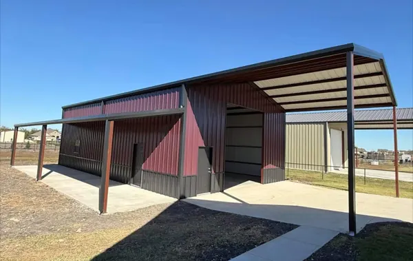 Red and tan metal siding panels on a commercial building, Sherman, TX
