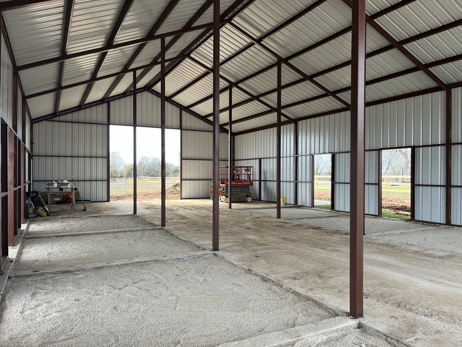 Open interior bays of a finished metal building