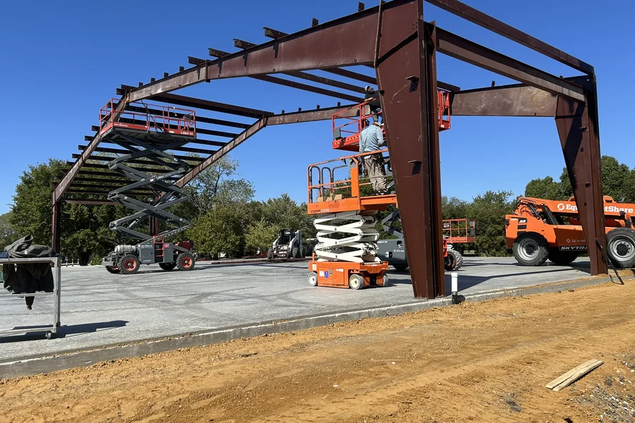 Welded steel building frame going up on a rural North Texas site